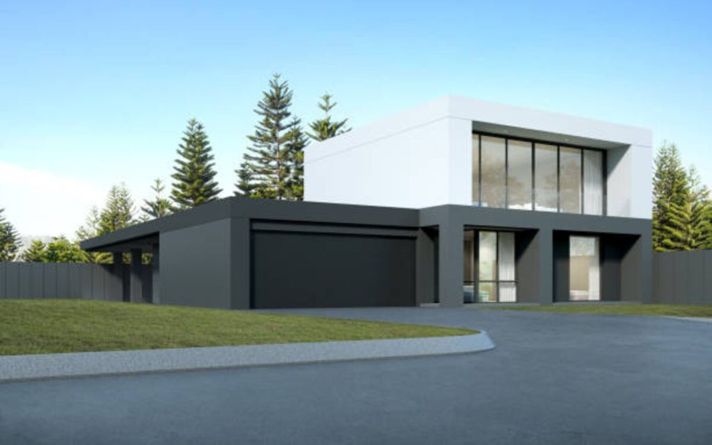 Black Garage Door Against a White House